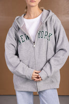 קפוצ׳ון אפור עם רוכסן וכיתוב NEW YORK לאישה, אופנת קז'ואל לנשים ונערות