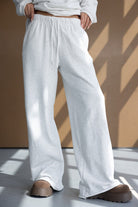 מכנסי טרנינג נשים אפורים בגזרה רחבה עם שרוך מותן, אופנת רחוב צעירה