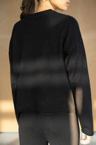 חולצת סריג שחורה לנשים בגזרה רחבה עם שרוולים ארוכים, אופנת חורף לנערות